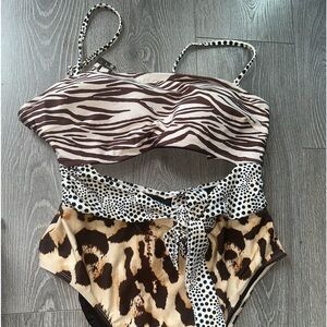 One piece suit by River Island